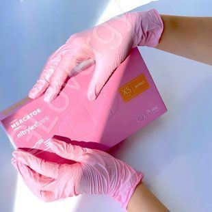 Рукавички нітрилові Nitrylex Pink рожевого кольору, розмір XS, 100 шт  1054 фото